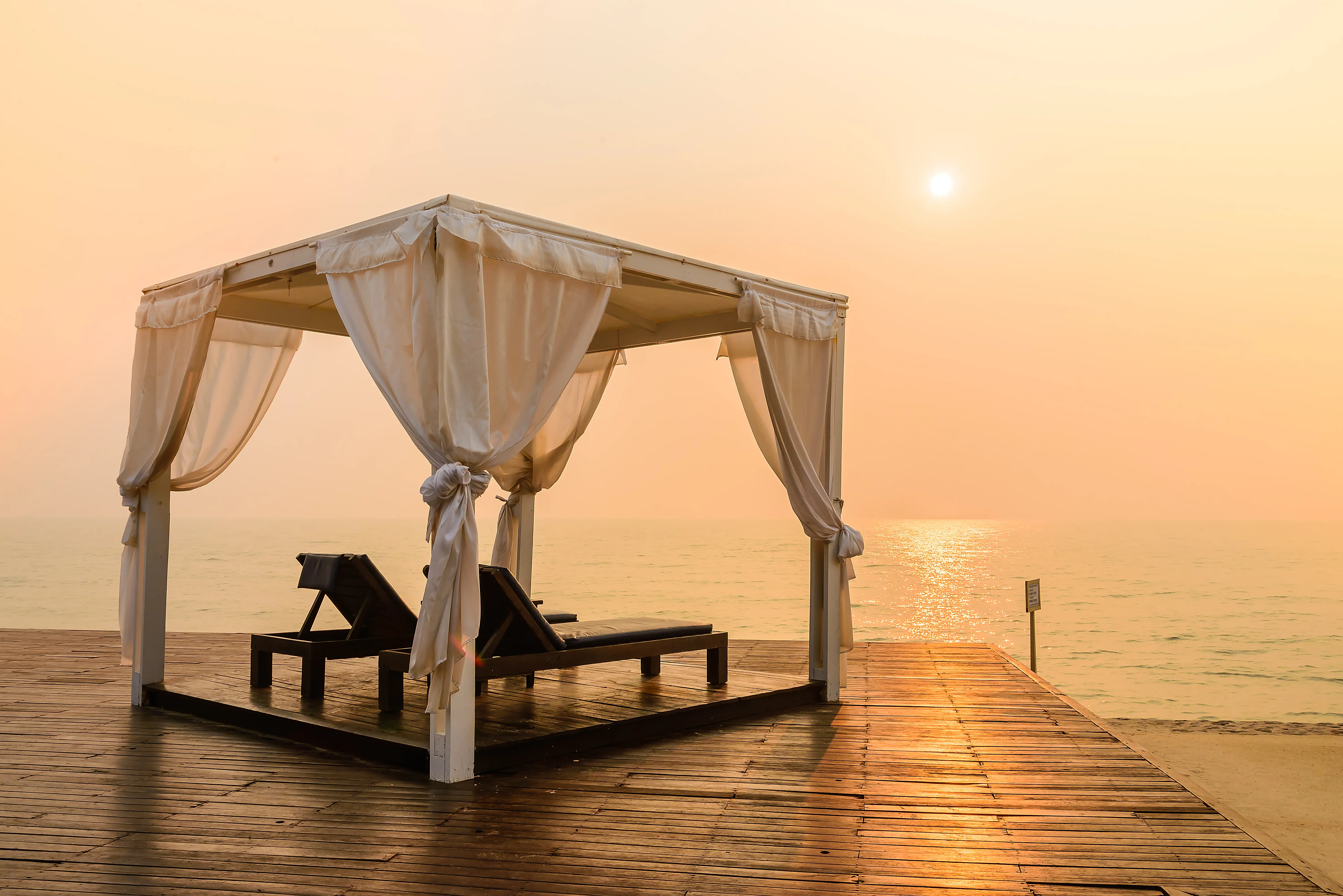 Relaxing spa room with massage tables and soft lighting